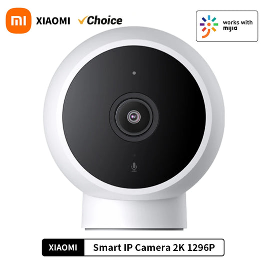 Xiaomi Smart IP Camera 2K HD from Waggy Tail showing night vision, AI alarm, and voice intercom features in a modern home setting.