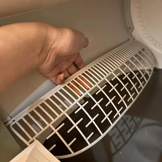 Waggy Tail smart cat litter box replacement accessories including a filter, door, bin, and pad, designed for easy maintenance.