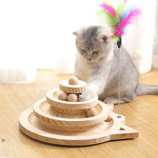 Wooden cat tower track toy with multiple levels, featuring spinning discs and balls for playful cat entertainment by Waggy Tail