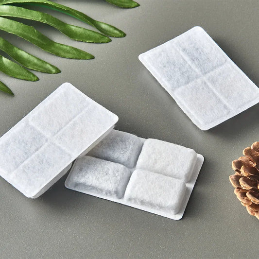 Waggy Tail cat water fountain replacement filters with coconut activated carbon, 12-pack, designed to keep water fresh and clean.