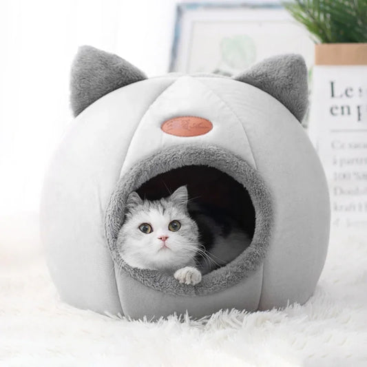 Cozy winter cat cave bed by Waggy Tail, deep sleep warm nest for cats and small dogs with soft, insulated fabric.